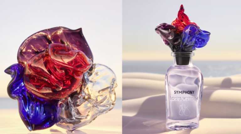 Un cabochon et un façon de Symphony, le nouveau parfum de Louis Vuitton, posés sur la plage