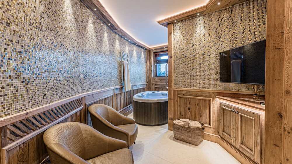 Jacuzzi Le Collectionist chalet Petit Ours Alpes Suisses